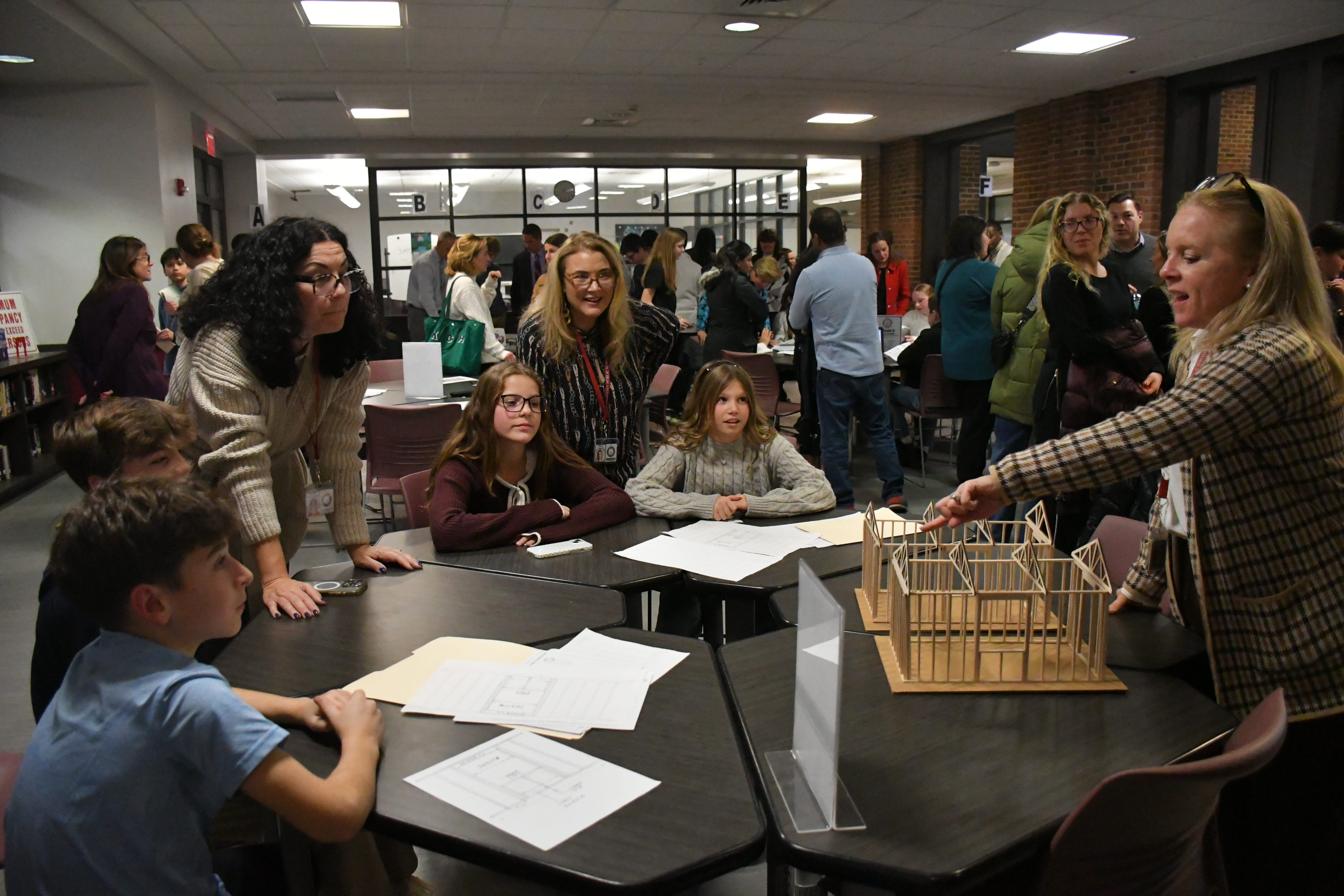 Garden City Middle School students share school updates and interactive displays at board of education meeting